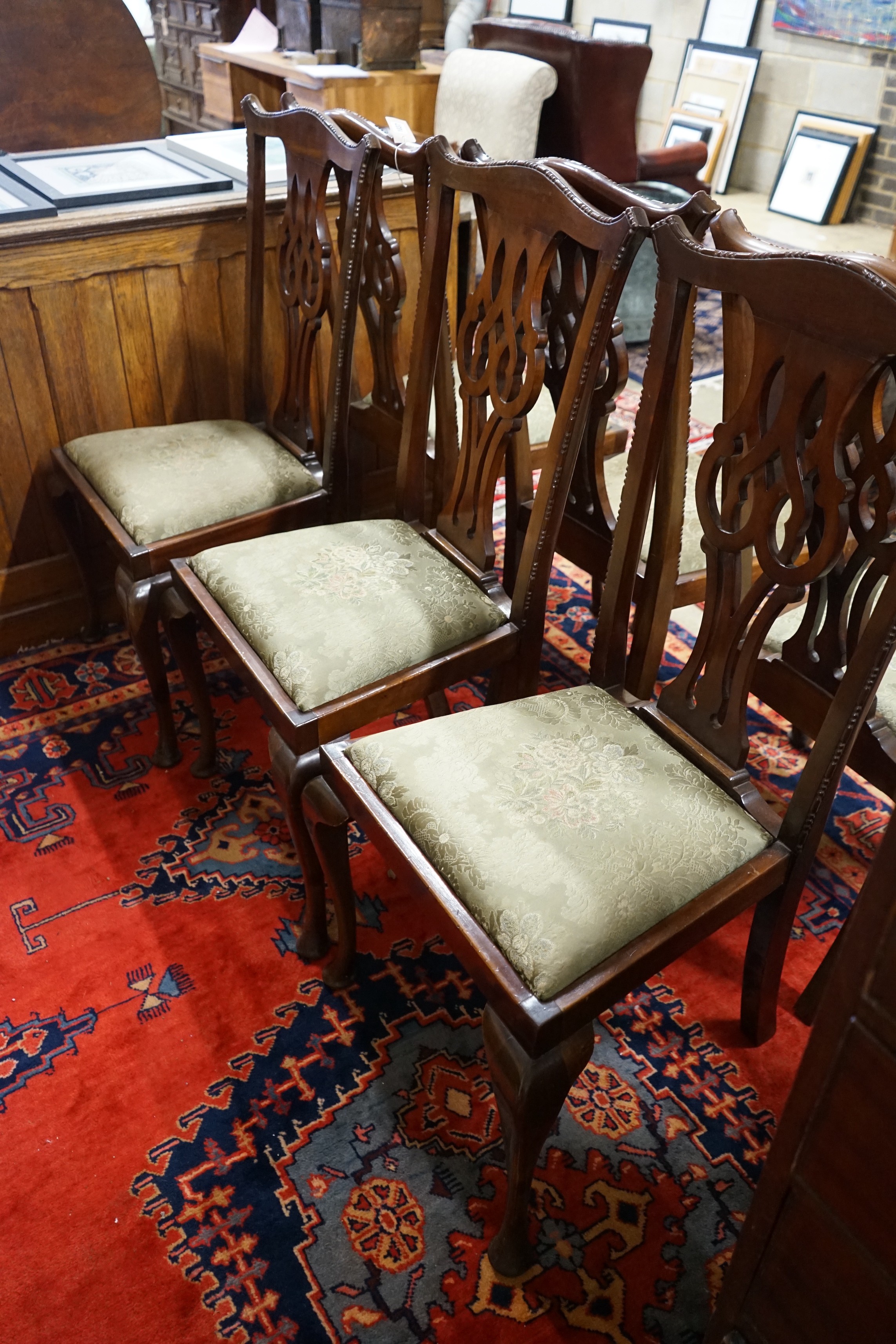 A set of six Chippendale style mahogany dining chairs